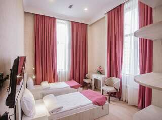 Хостелы Alfa Hotel & Hostel Баку Двухместный номер Делюкс с 2 отдельными кроватями-1